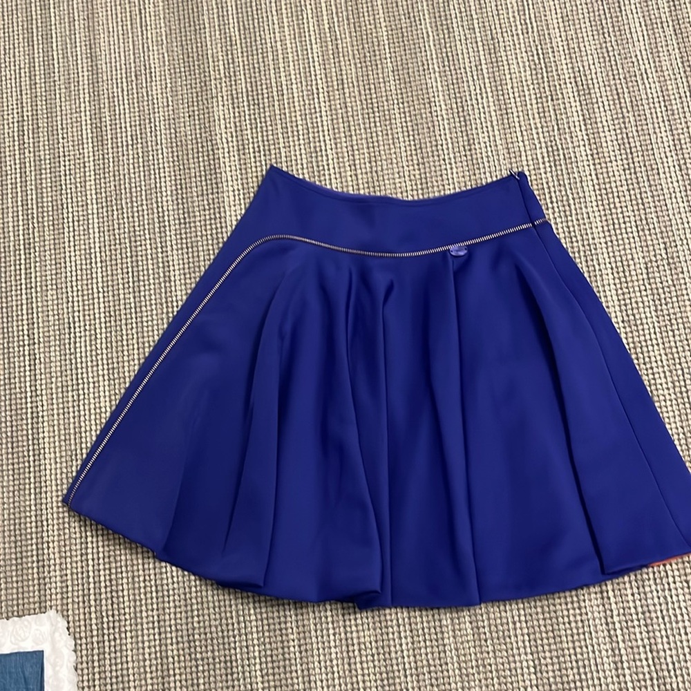 Val Max gorgeous purple girls skirt size 12 with orange lining.